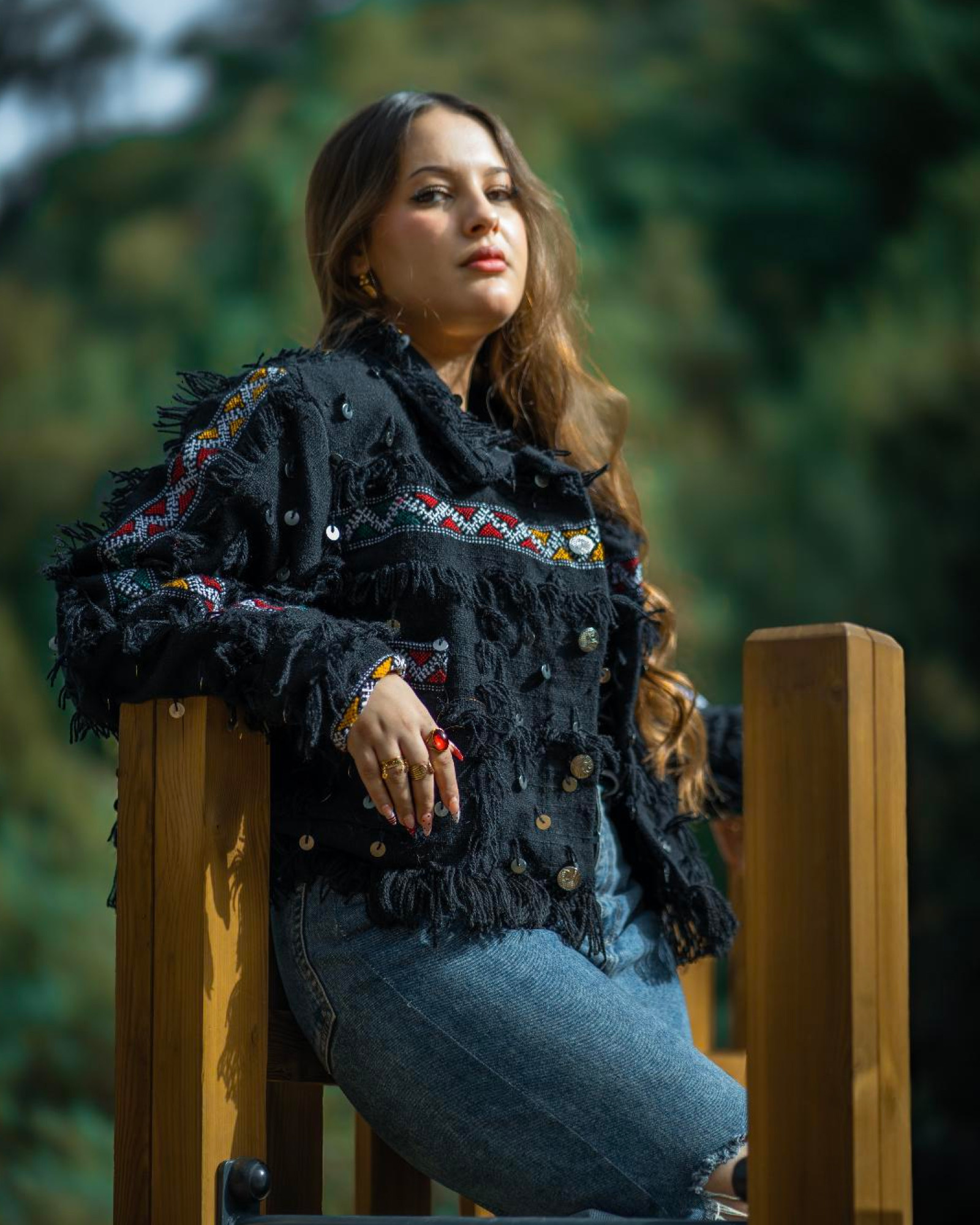 Model wearing the black Amazigh handmade jacket outdoors